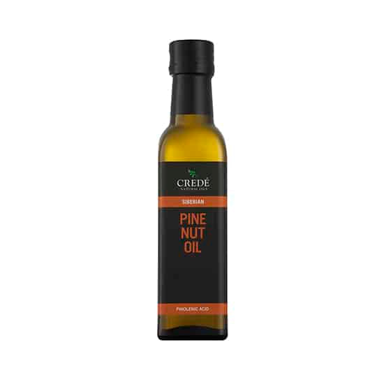 Crede Siberian Pine Nut Oil in a dark amber bottle with a pour spout, showcasing the light golden oil, perfect for cooking and skin care.