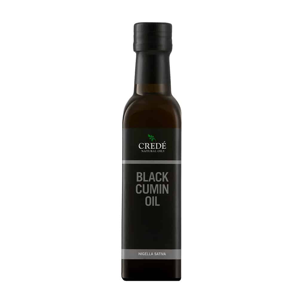 Crede Black Cumin Oil in a dark amber bottle with a dropper cap, showcasing the rich, dark-colored oil, ideal for immune support and skin health.