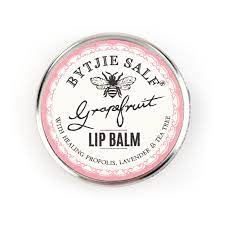 Bytjie Salf grapefruit lip balm in round tin, label top view