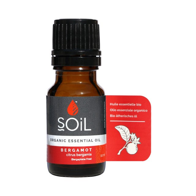 Amber glass organic bergamot essential oil bottle with black ribbed cap, Soil label