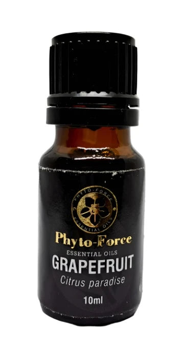 A bottle of Phyto-Force Organic Grapefruit Essential Oil with its natural and organic label, placed next to fresh grapefruit slices.