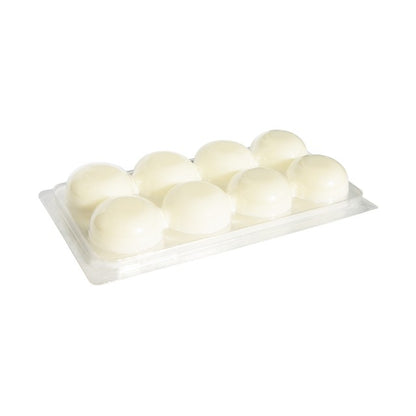 Clear plastic tray of pale cream soy wax melt rounds